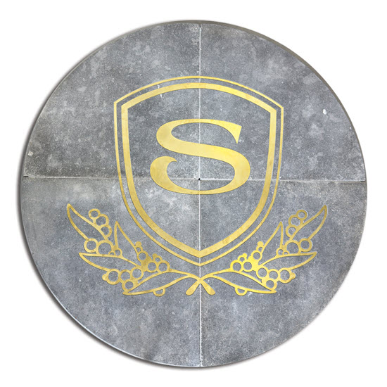 granite-gold-brass-inlay-family-crest-550x550